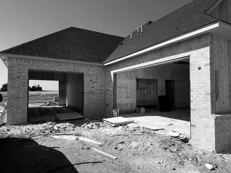 Before: New home: two garages closed up