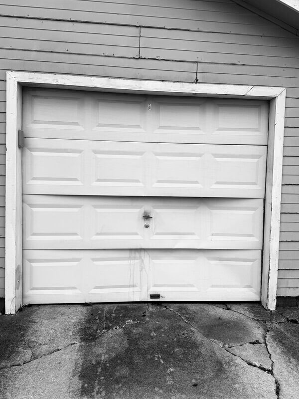 Before: Old dented door replaced